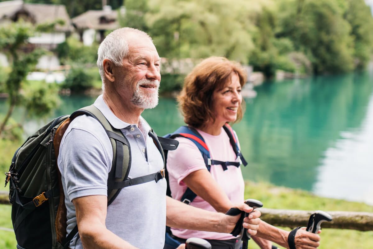 a senior couple on a hike