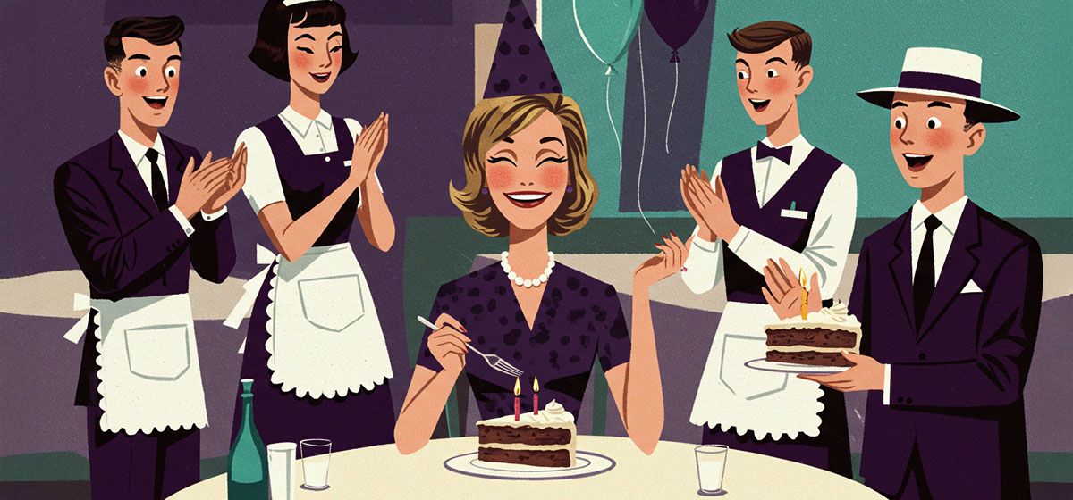 a woman enjoying a free slice of cake while restaurant staff sing 'Happy Birthday' to her