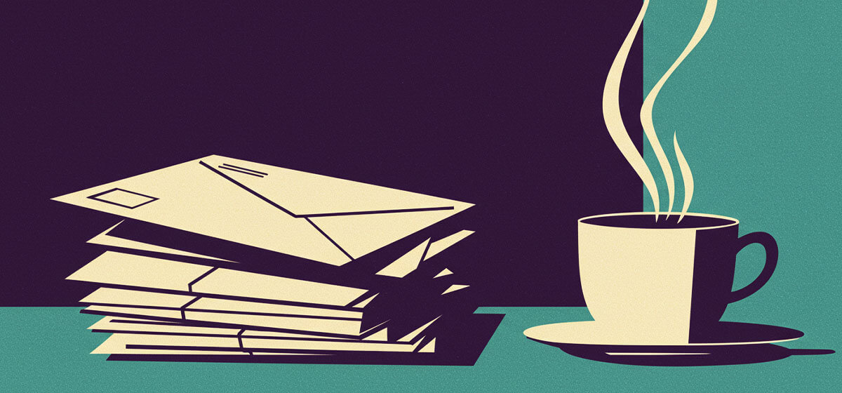 a stack of bills next to a coffee cup