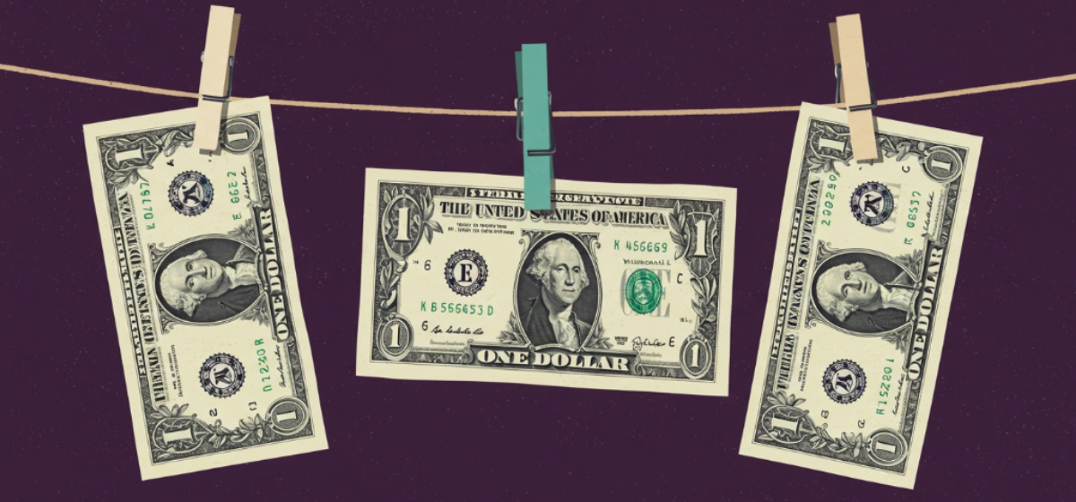 An illustration of dollar bills hanging on a clothesline