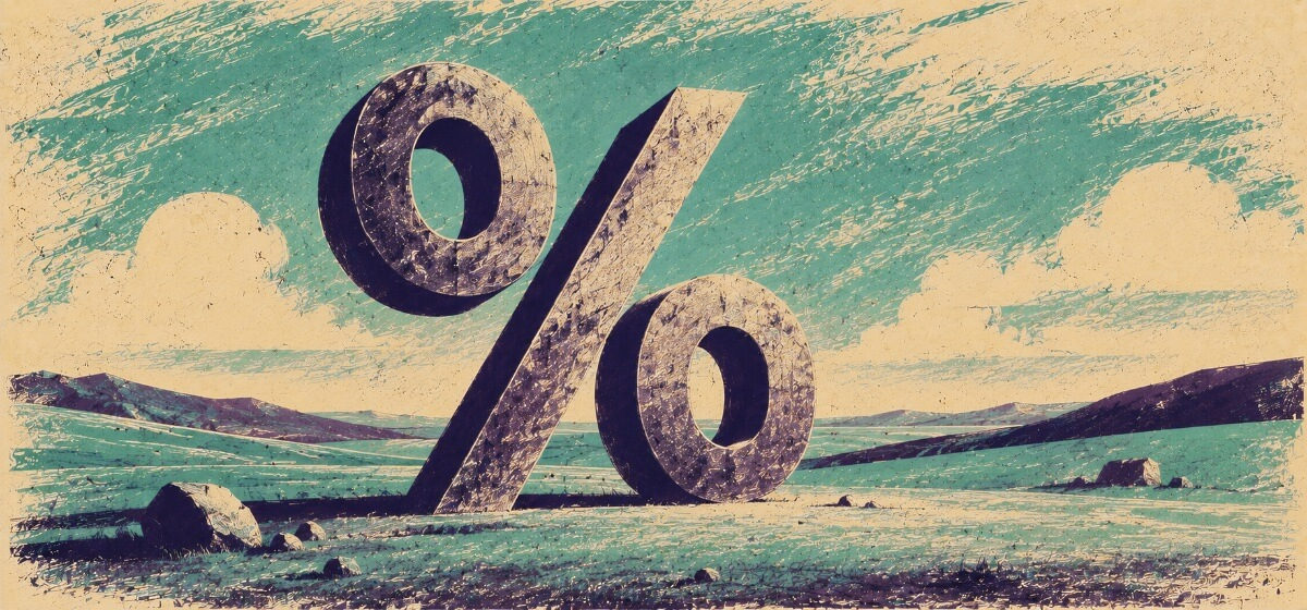 a percentage symbol in an open landscape