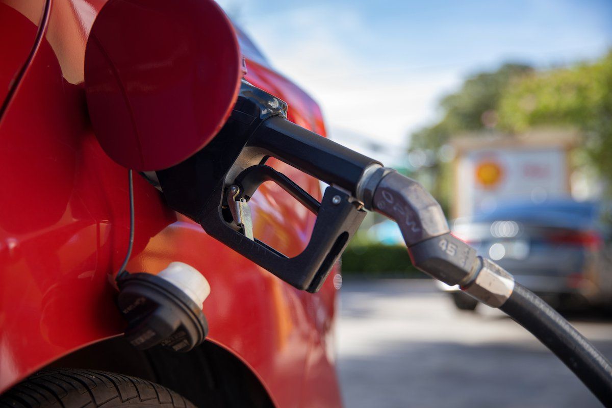 a car at the fuel pump