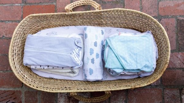 Swaddled + settled=happy baby + happy parents