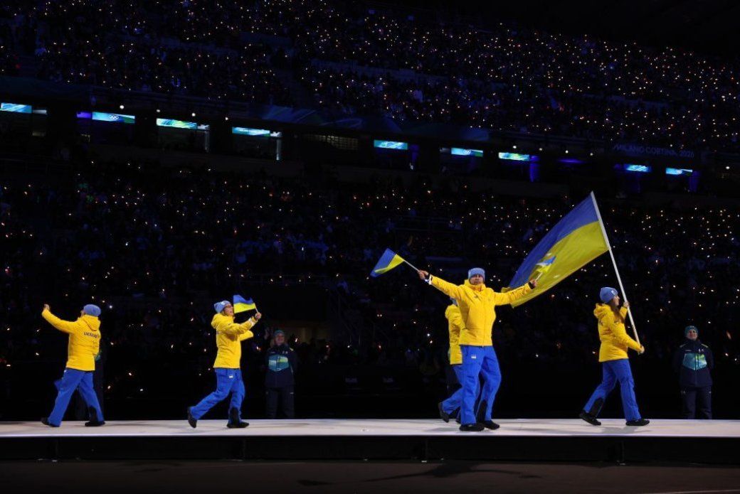 Fans’ boos, cheers at Olympic opening ceremony deliver message in their own way