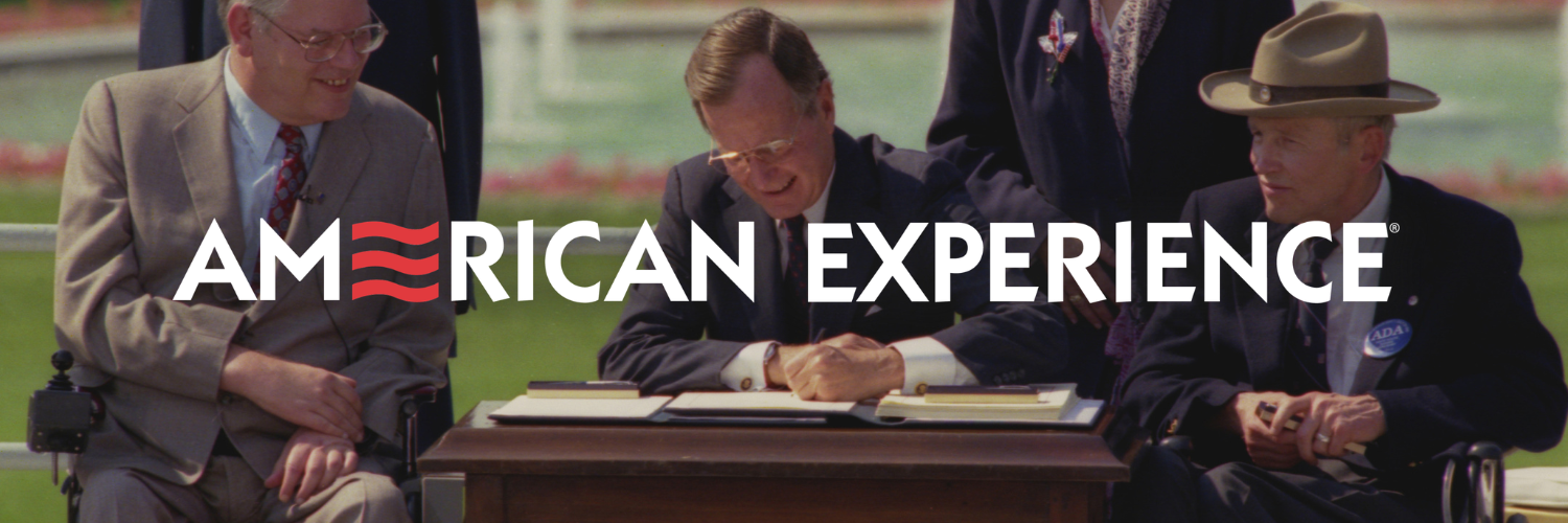 President George Bush signing the Americans with Disabilities Act on the South Lawn of the White House with Evan Kemp, Chair of the Equal Employment Opportunity Commission; Rev. Harold Wilke; Swift Parrino, Chair of the National Council on Disability; and Justin Dart, Chair of the President's Committee on Employment of People with Disabilities.