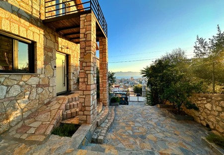 Built in traditional stone, this three-bedroom villa enjoys sea and city views. It is listed for €385,000.