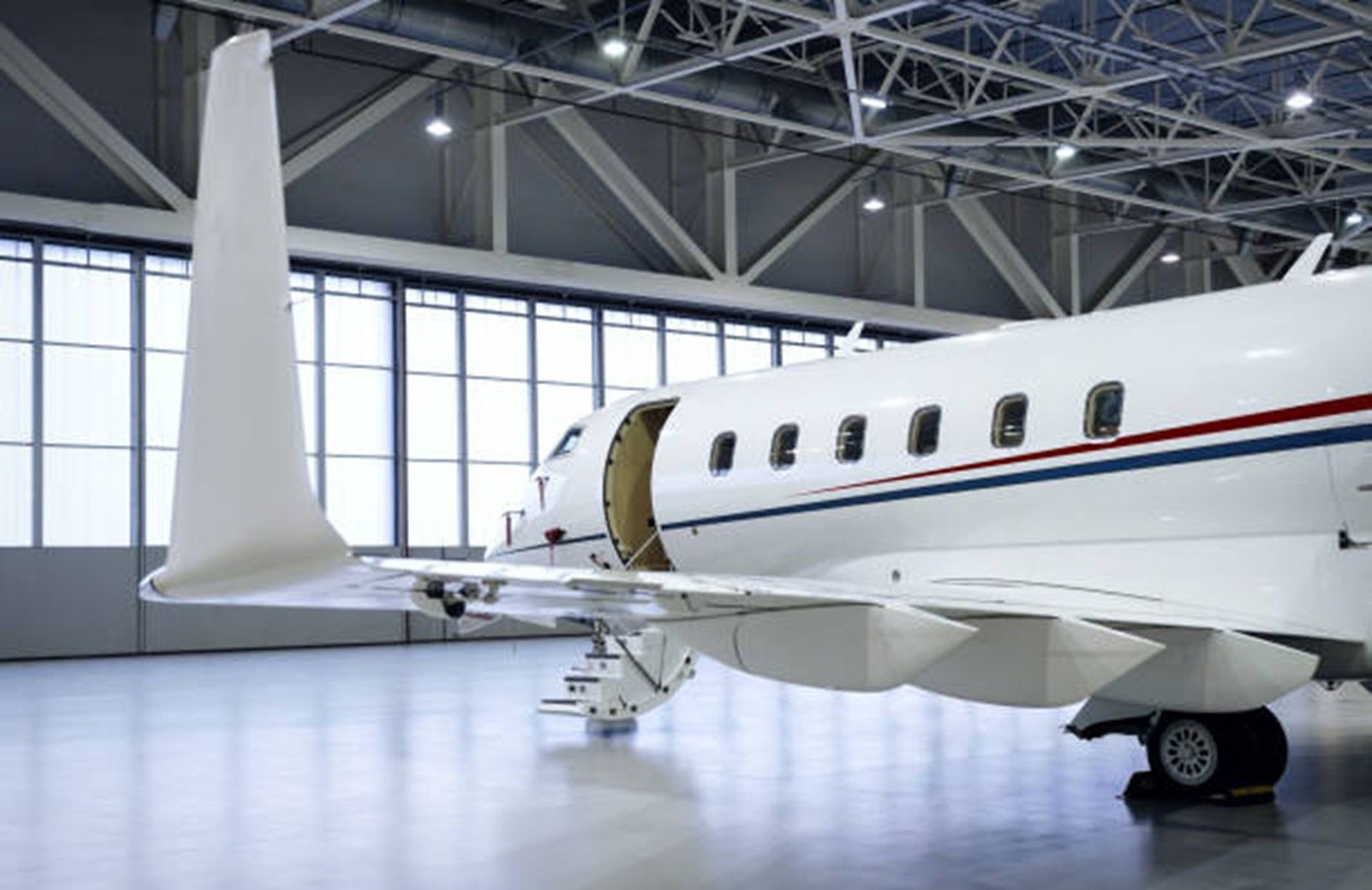 Private jet in an aircraft hangar