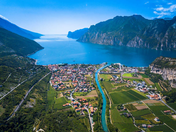 Italian town and mountain lake landscape