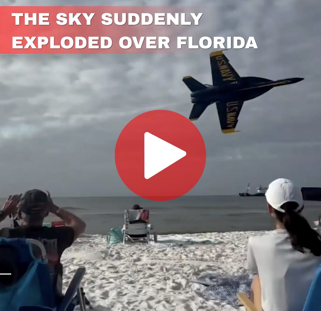 Blue Angels jet flying low over beach