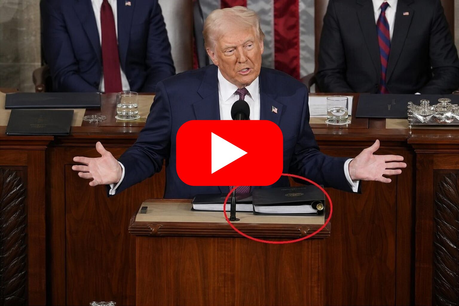 Donald Trump speaking at a podium with binders