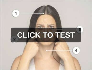 Woman pointing at numbered locations on her face
