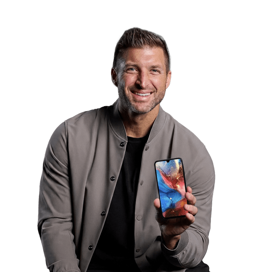 Image of Tim Tebow holding the Bark Phone