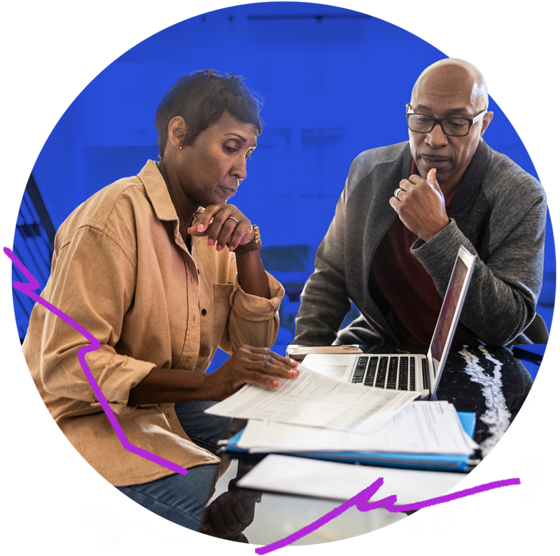 Man and woman working on documents together