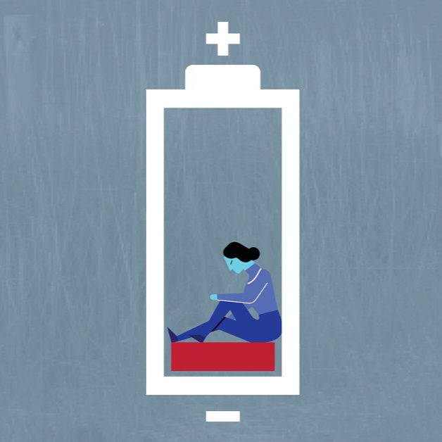 Image of an exhausted teacher sitting at the bottom of a battery showing low charge.