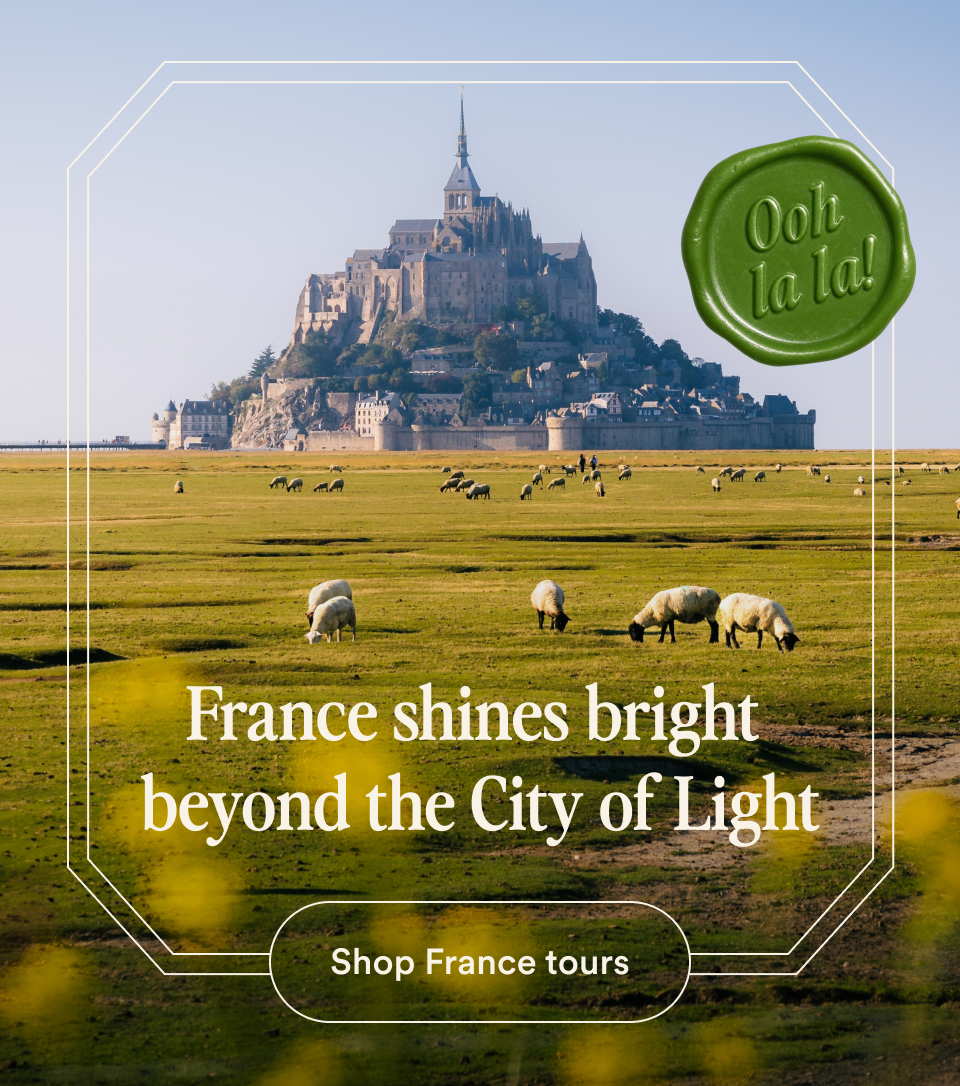Mont Saint-Michel with sheep grazing, Ooh la la seal, France shines bright beyond the City of Light headline and Shop France tours — opens France tours.