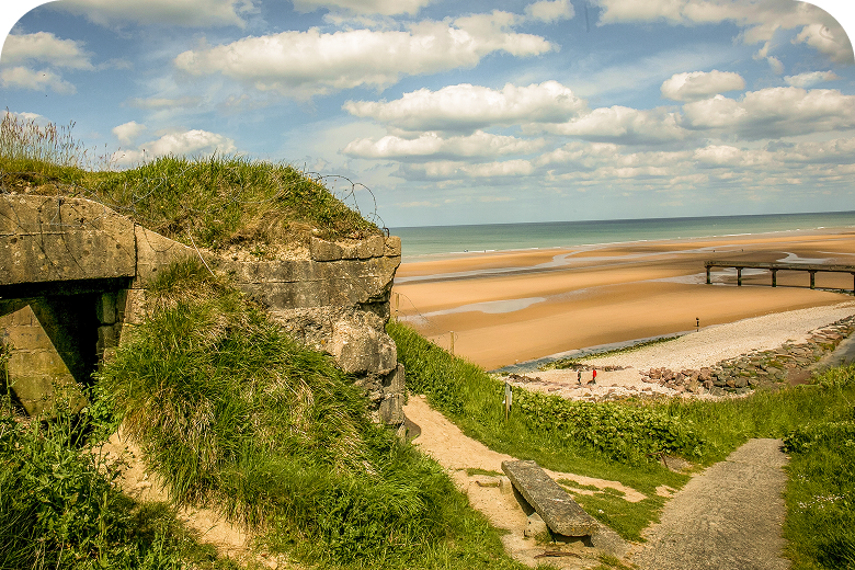 Normandy coastal bunker overlooking the beach on Paris, Normandy, Brittany Coast & the Loire Valley — opens itinerary.