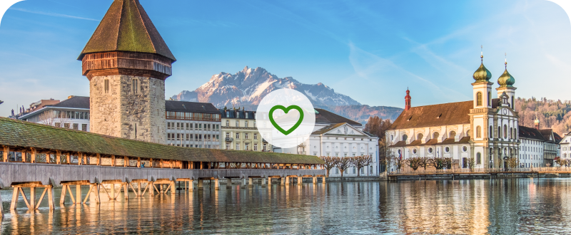 Lucerne waterfront and mountains with wish list heart — explore A Week in Switzerland tour