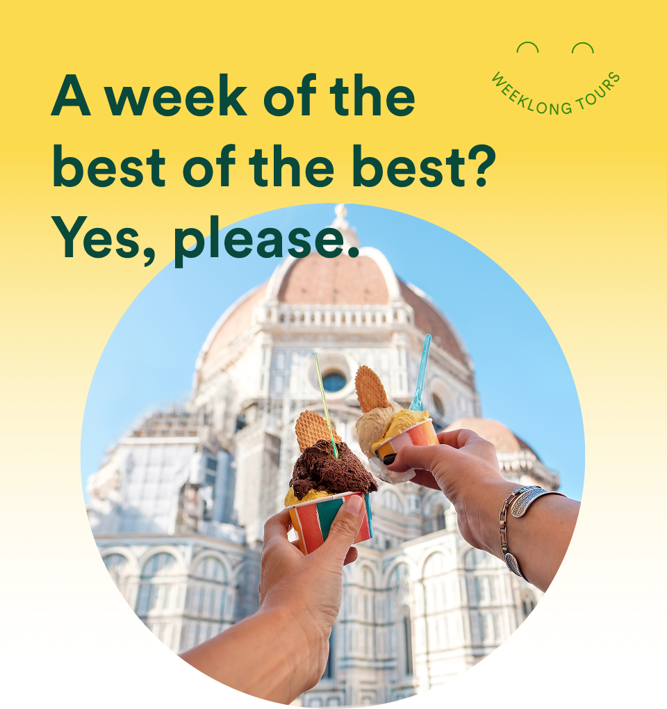 Go Ahead Tours Weeklong Tours hero: &ldquo;A week of the best of the best? Yes, please.&rdquo; Two travelers toasting with gelato cups in front of the Florence Duomo; Weeklong Tours badge. Opens Weeklong Tours hub.