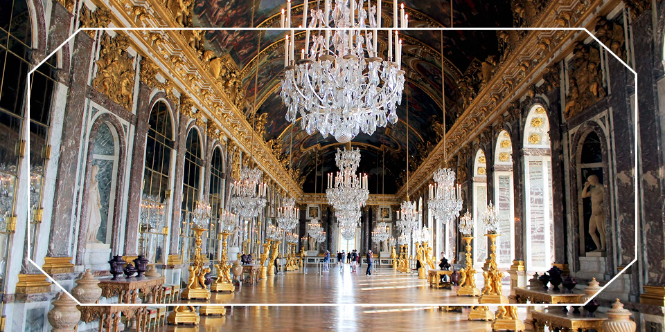 Crystal chandeliers and gilded mirrors in the Hall of Mirrors at the Palace of Versailles — opens A Week in Paris itinerary