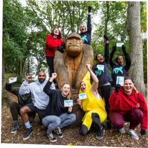 A group of children at a birthday party wearing Go Ape mascot gorilla masks