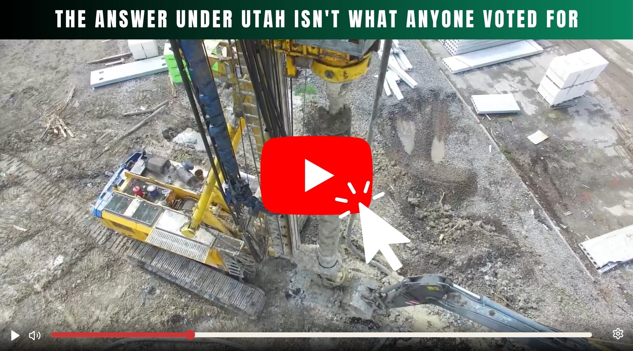Yellow drilling rig at a construction site