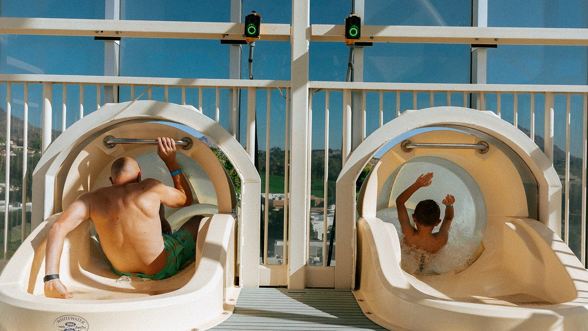Family going down waterslide