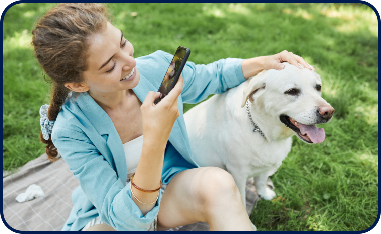 A Girl with Phone and dog