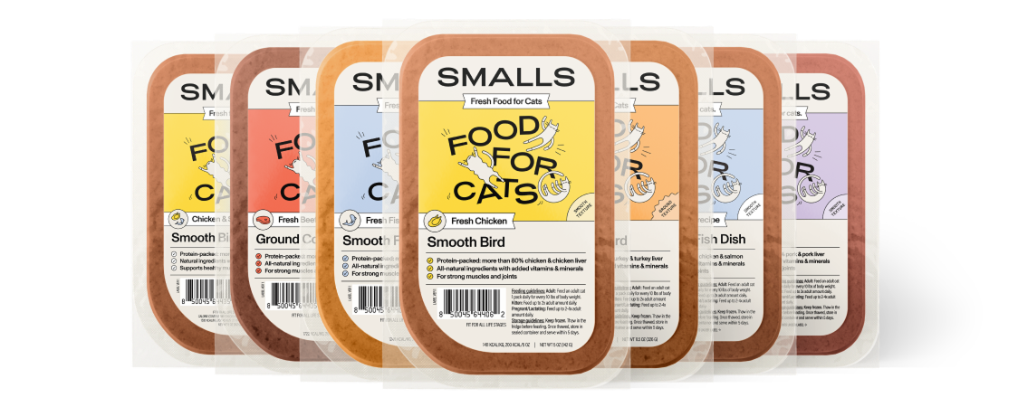 Lineup of seven Smalls 'Food for Cats' fresh food packs fanned out.