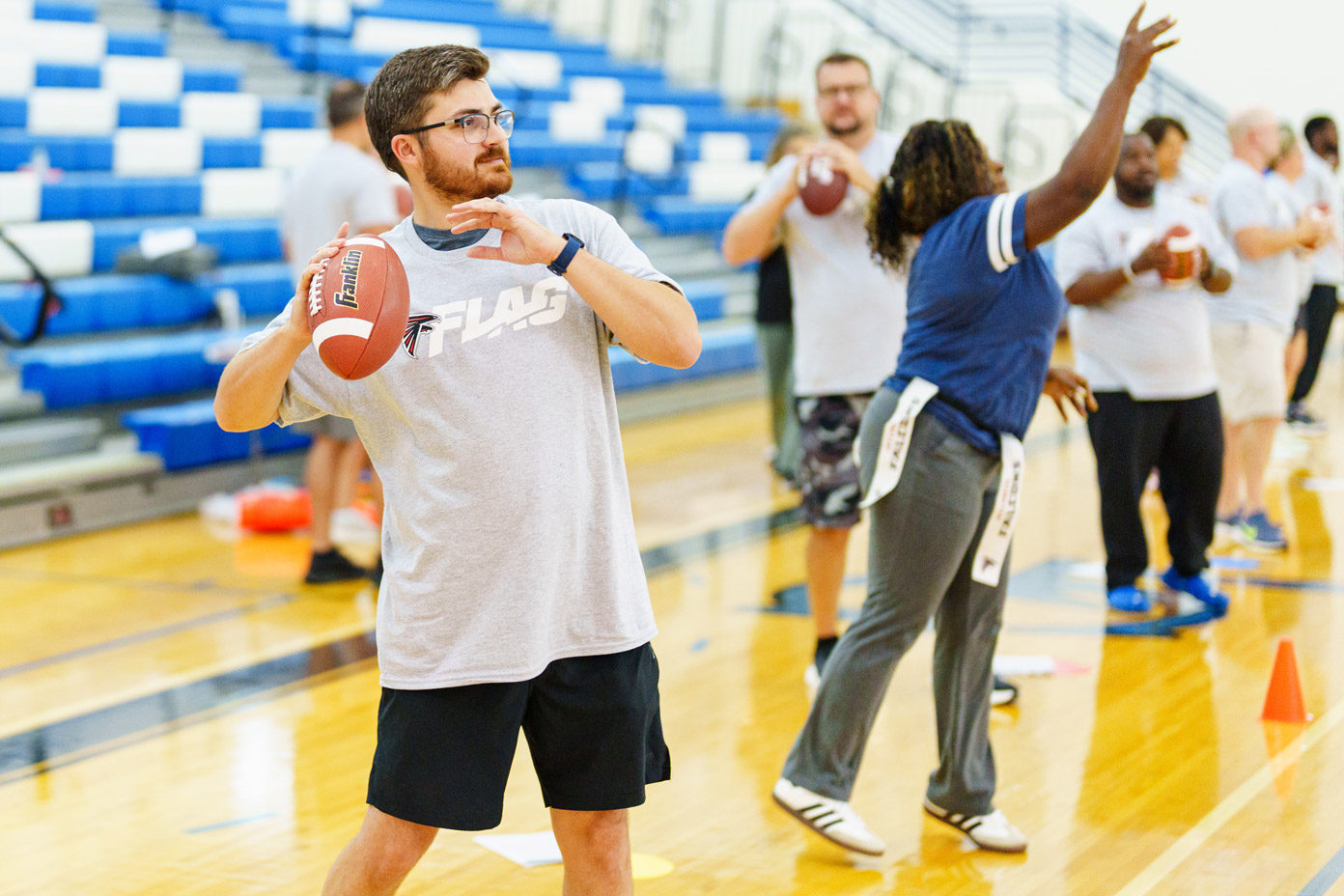 Student athletes participate in a flag football training session