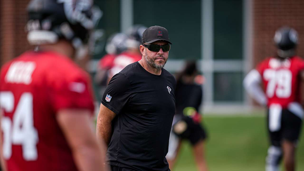 Todd McClure with players at practice
