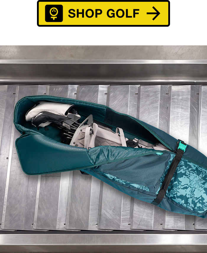 Golf bag inside travel cover on baggage claim
