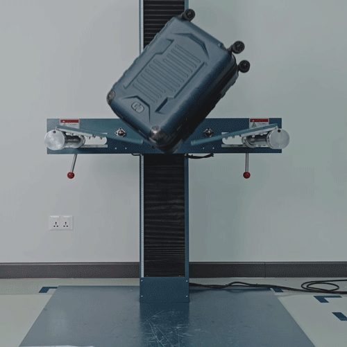dropping luggage to test impact