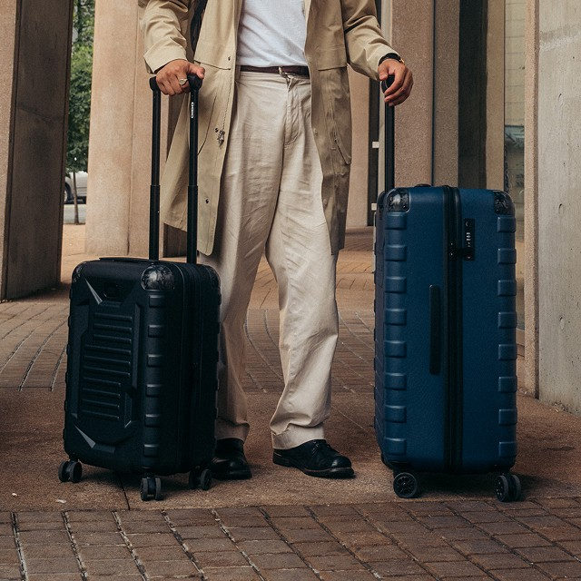 renegade vault carry-on in black and renegade vault checked bag in dress blues