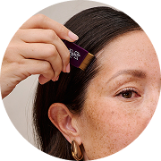 woman filling hair line