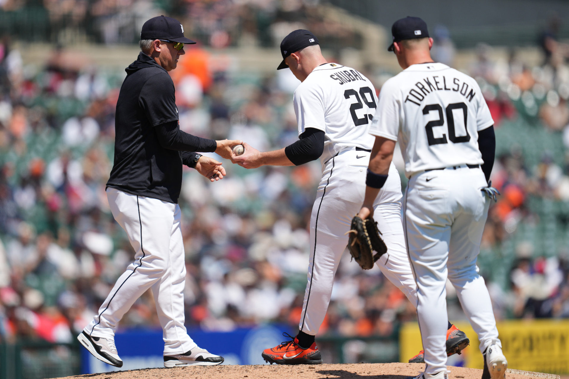 A.J. Hinch takes the ball from Tarik Skubal