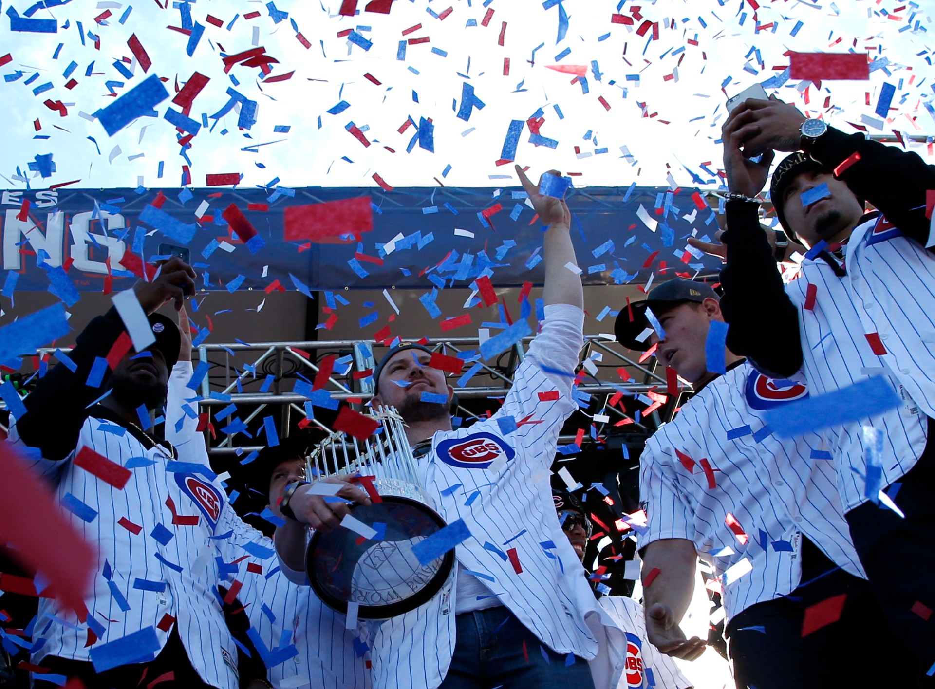 Jon Lester, Cubs with World Series trophy