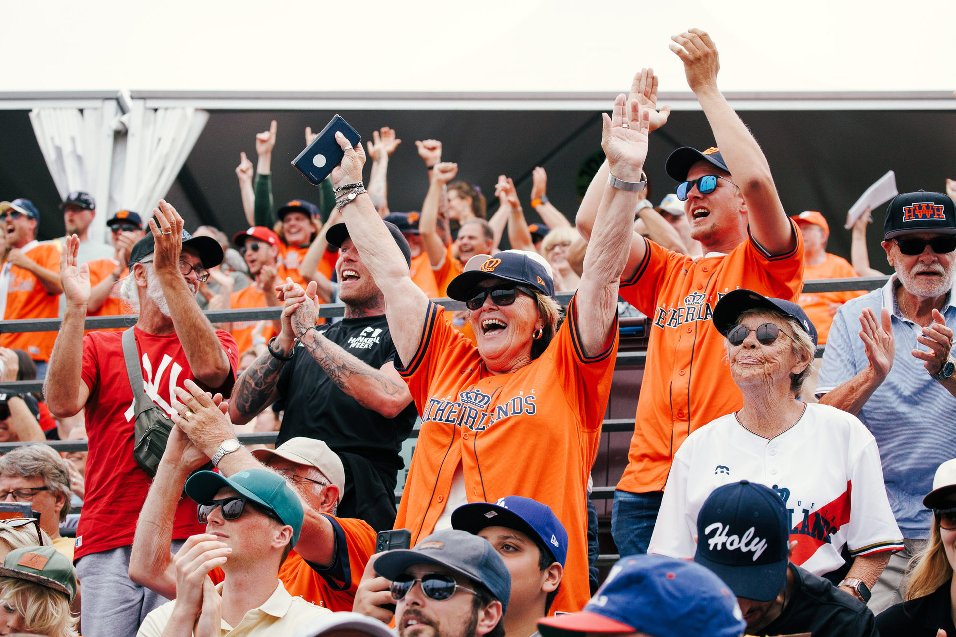 Fans cheer at Pim Mulier Stadium in Haarlem. Photo by @linedrivecaptures.
