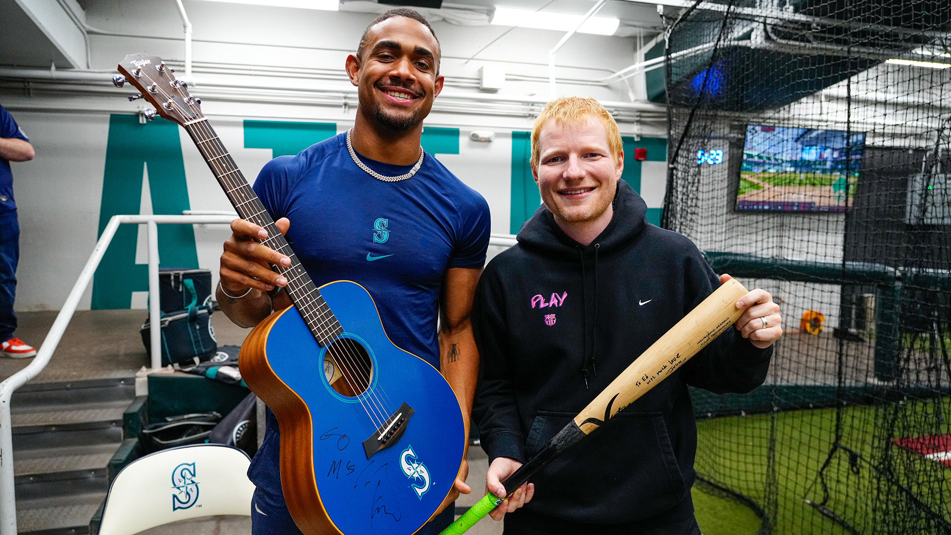 Julio Rodríguez and Ed Sheeran