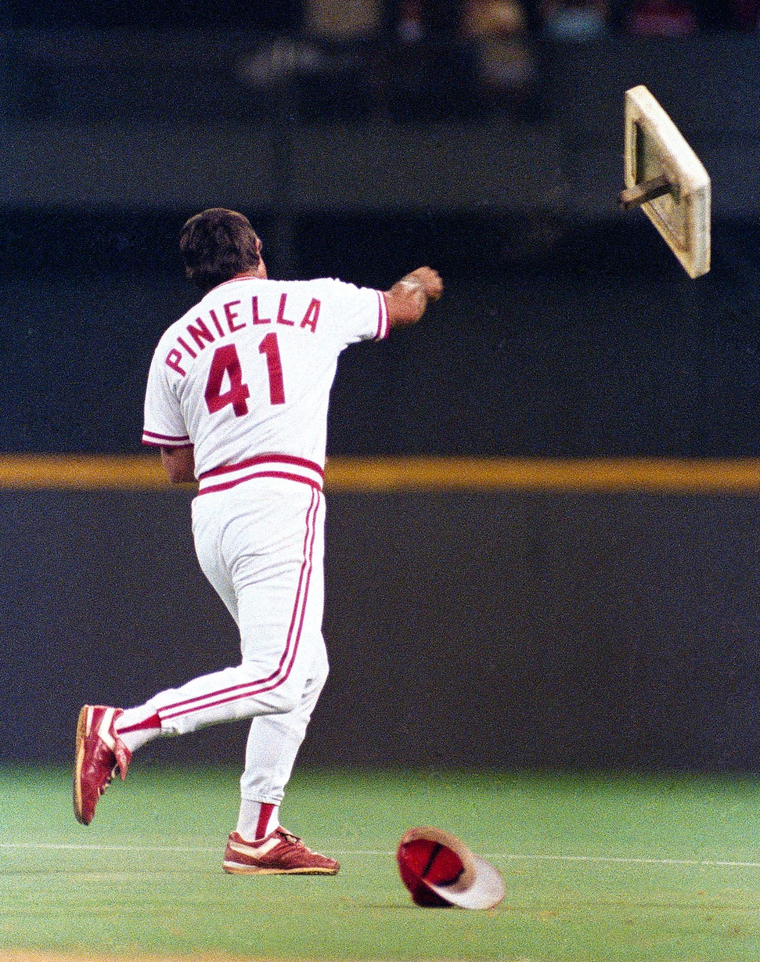 Lou Piniella throws first-base bag