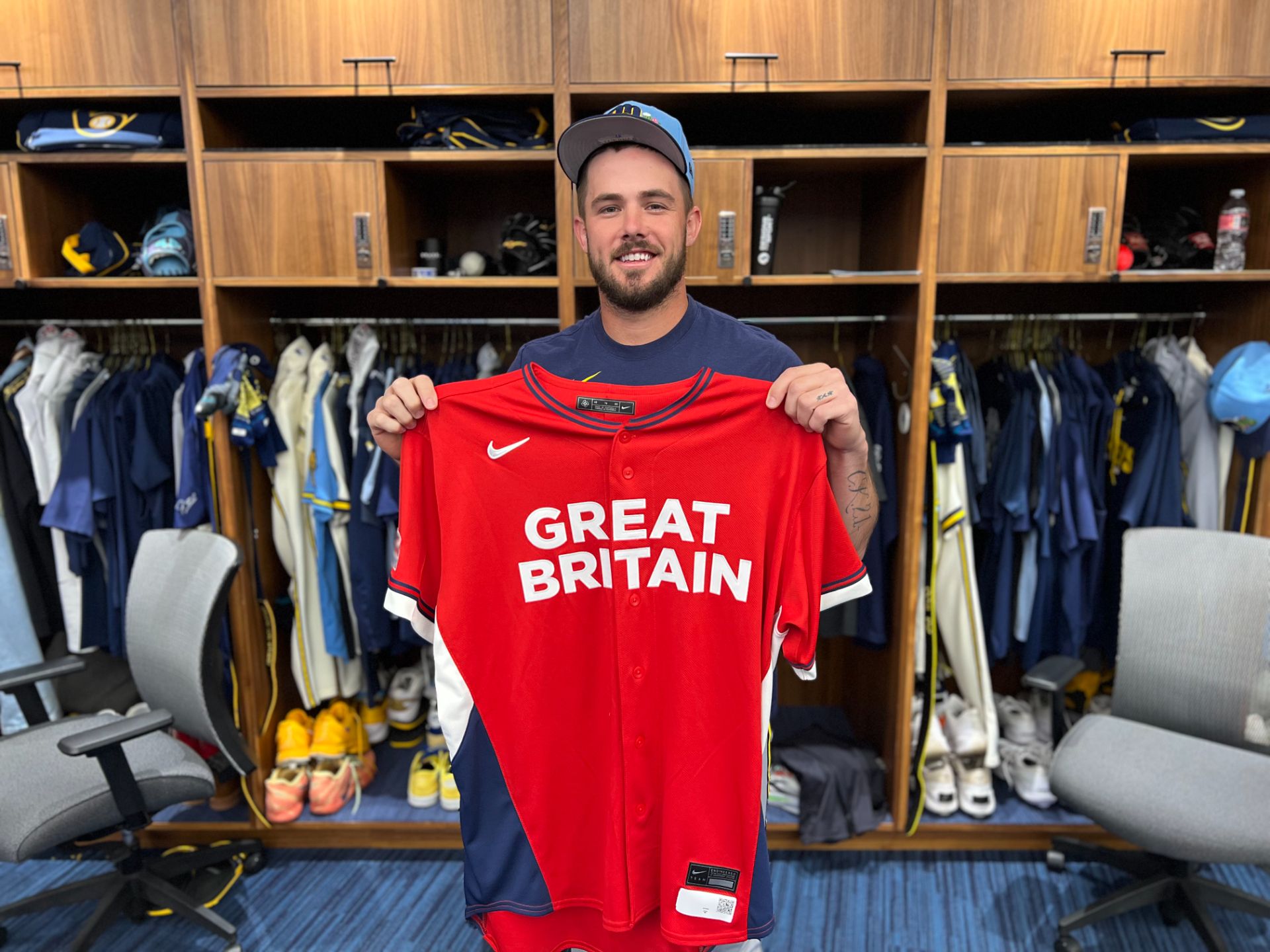 DL Hall holding a Great Britain jersey (Photo: Adam McCalvy / MLB.com)
