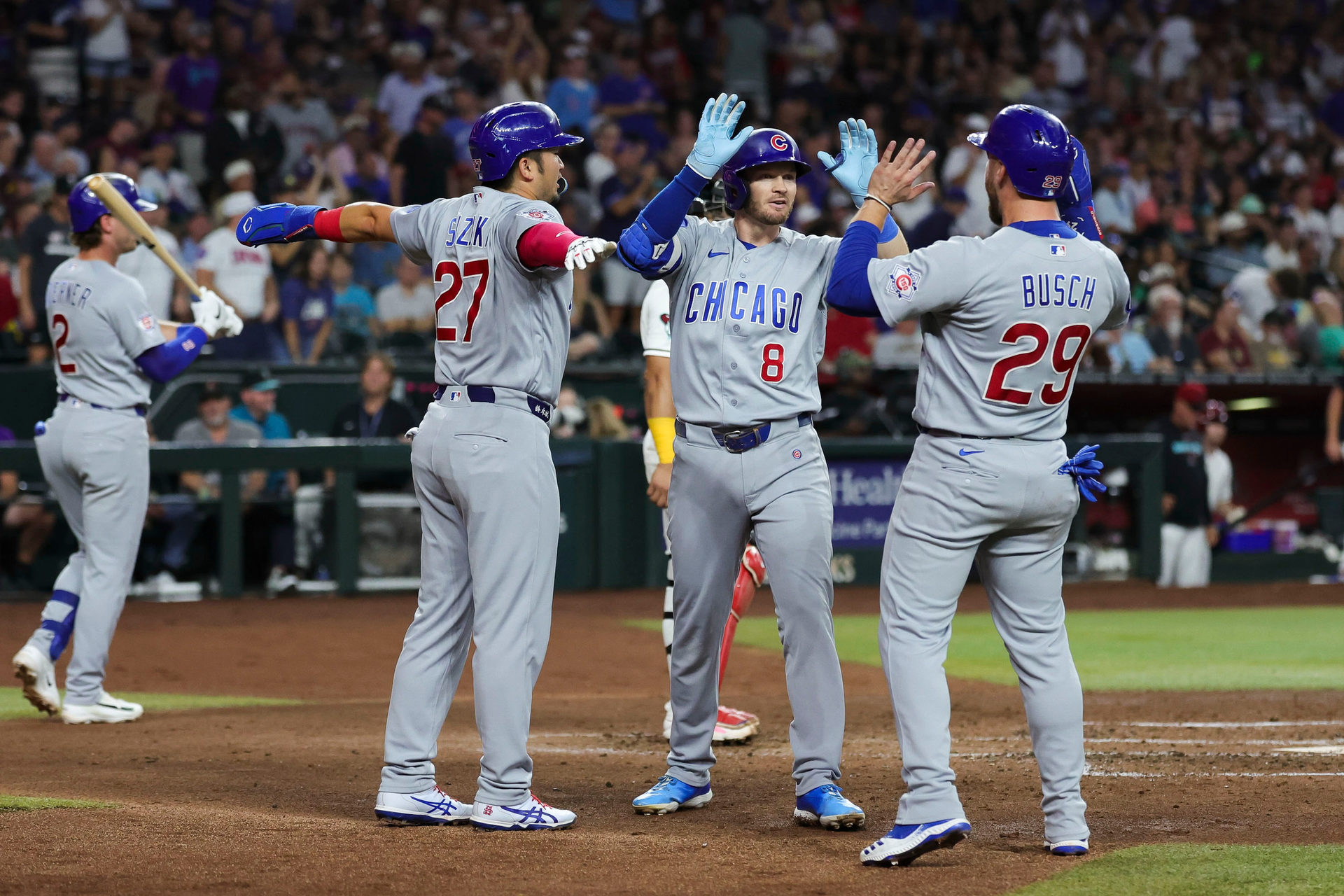 Seiya Suzuki, Ian Happ and Michael Busch