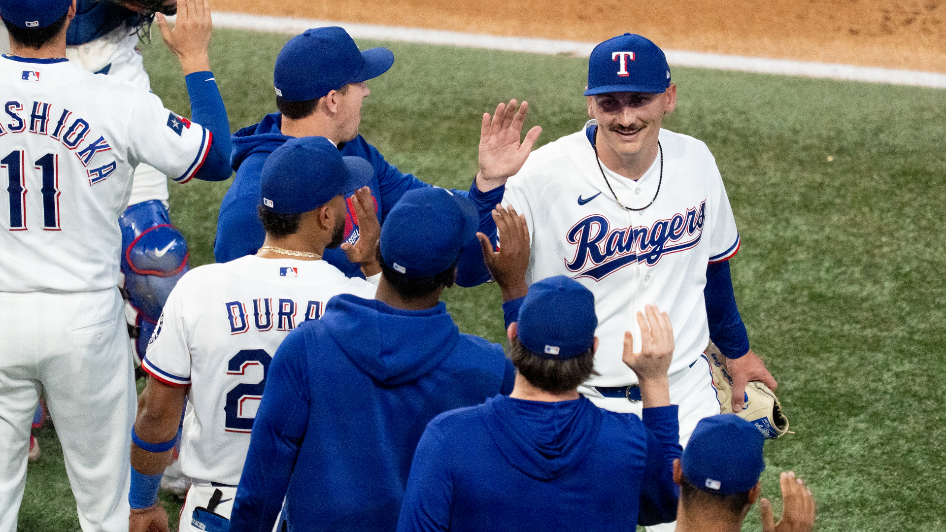 Peyton Gray is congratulated by teammates