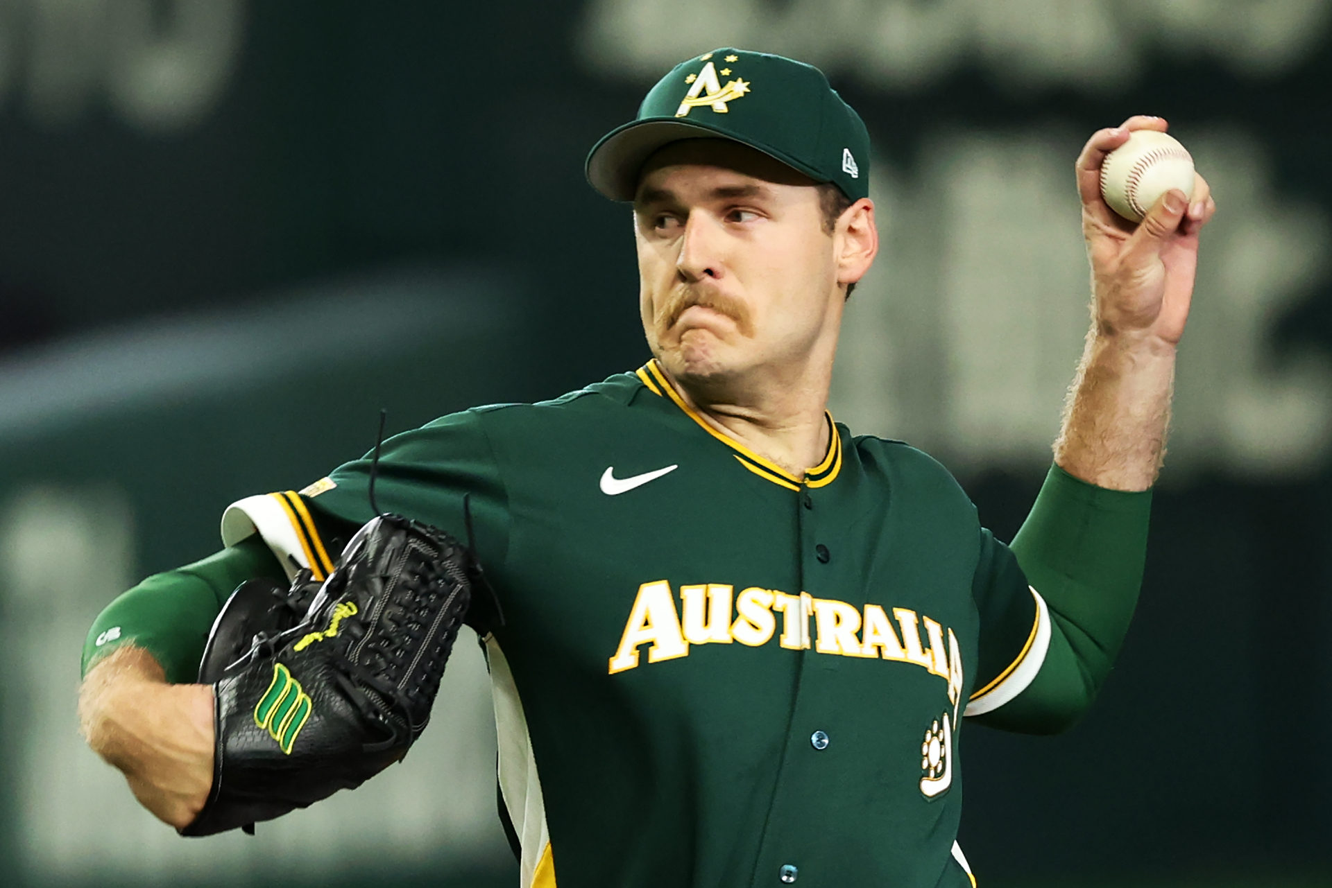 Josh Hendrickson pitches for Team Australia