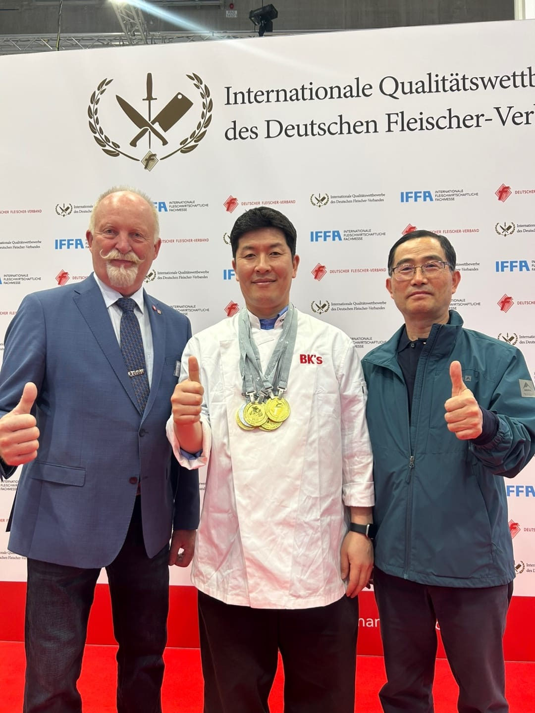 Kim with the medals he earned from the German Butchers' Association. 