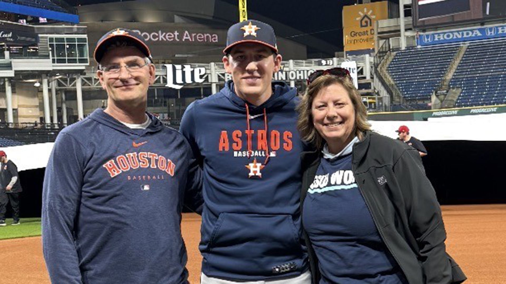 AJ Blubaugh with parents Erin and Reggie