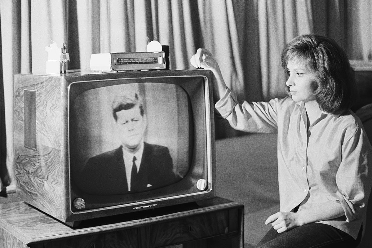 Italian actress Gina Lollobrigida watches the Telstar broadcast in Rome on July 23, 1962