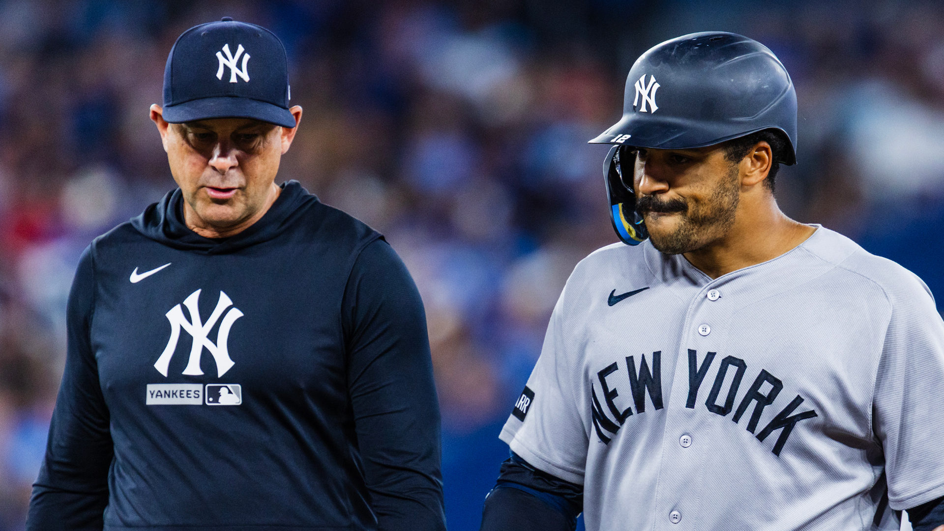 Aaron Boone and Trent Grisham
