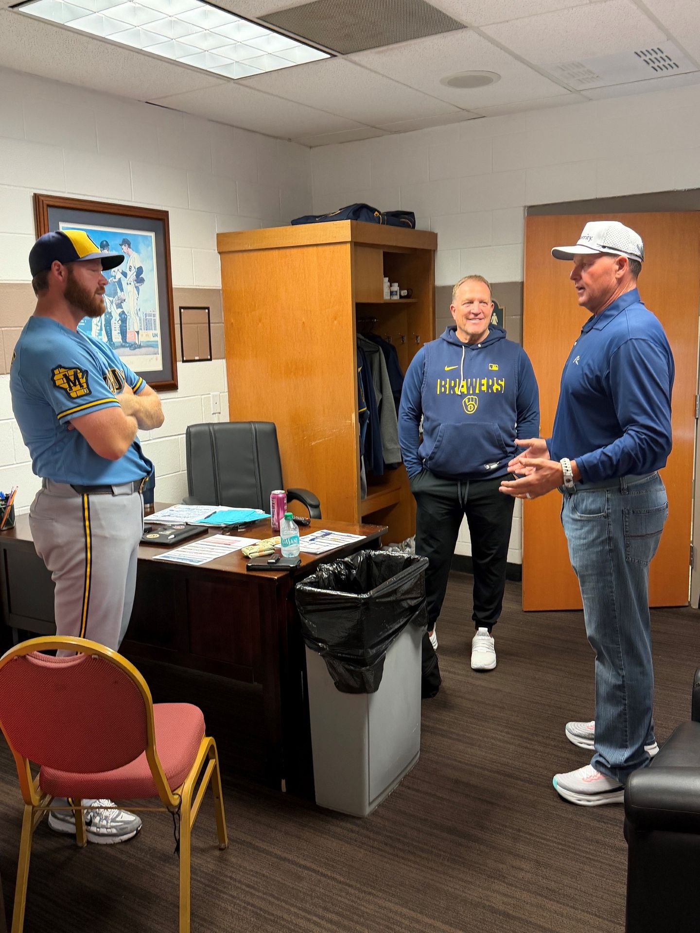Brandon Woodruff (left) chats with Roger Clemens