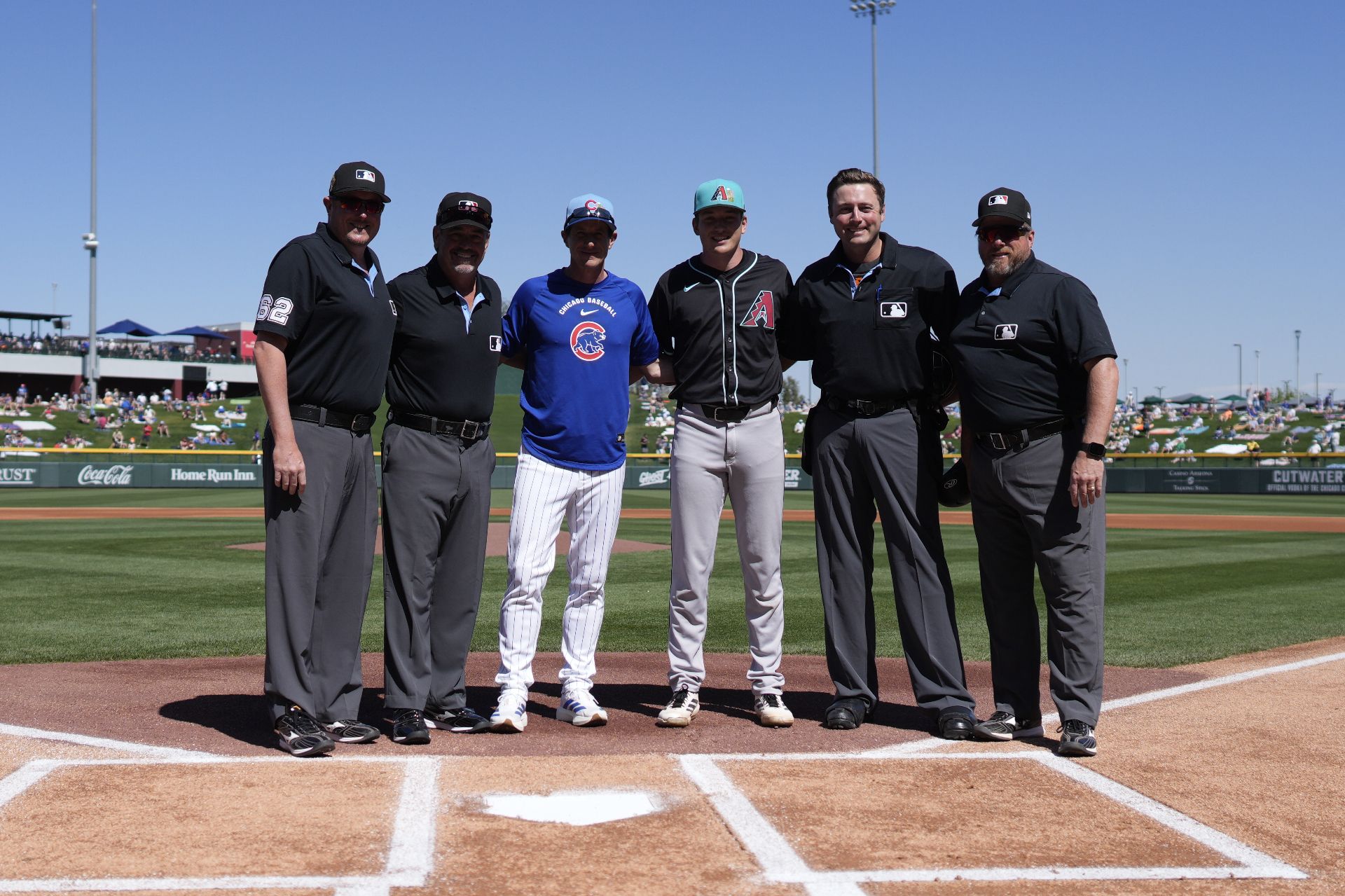 Craig Counsell and Brady Counsell with umpires