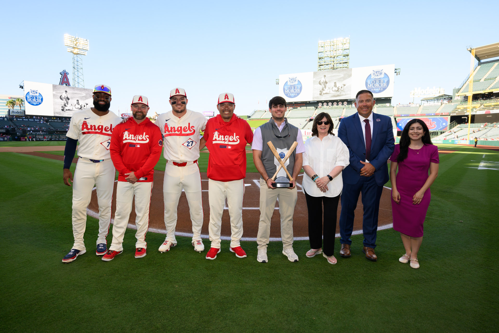 Jo Adell, Kirby Yates, Mike Trout, and Kurt Suzuki with B.A.T.